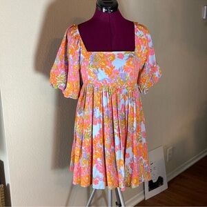 Shop Neighbor bright floral dress
